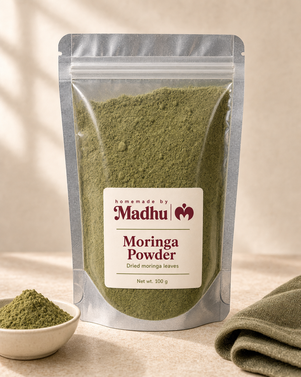 Moringa Powder 100 g pouch with Homemade by Madhu branding